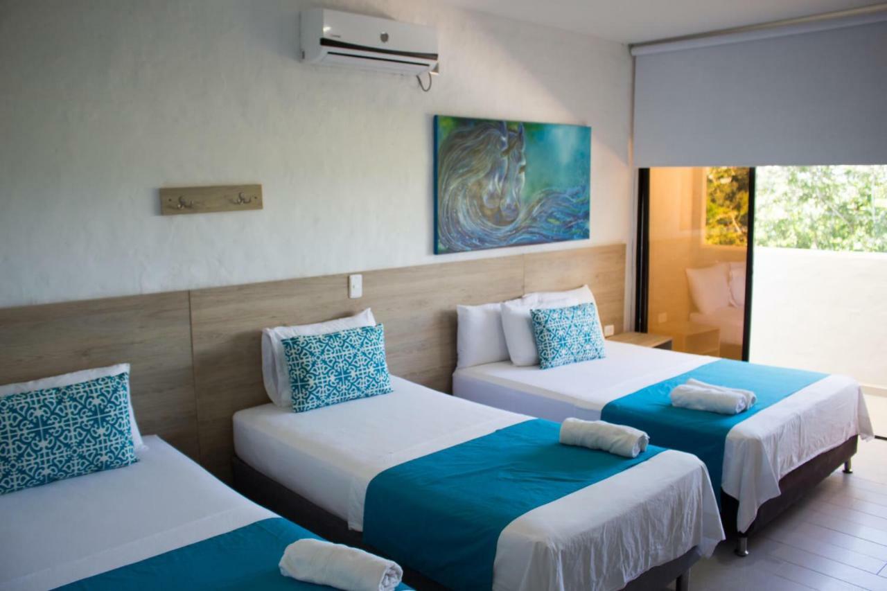 Hotel Aldea Plaza Doradal Buitenkant foto